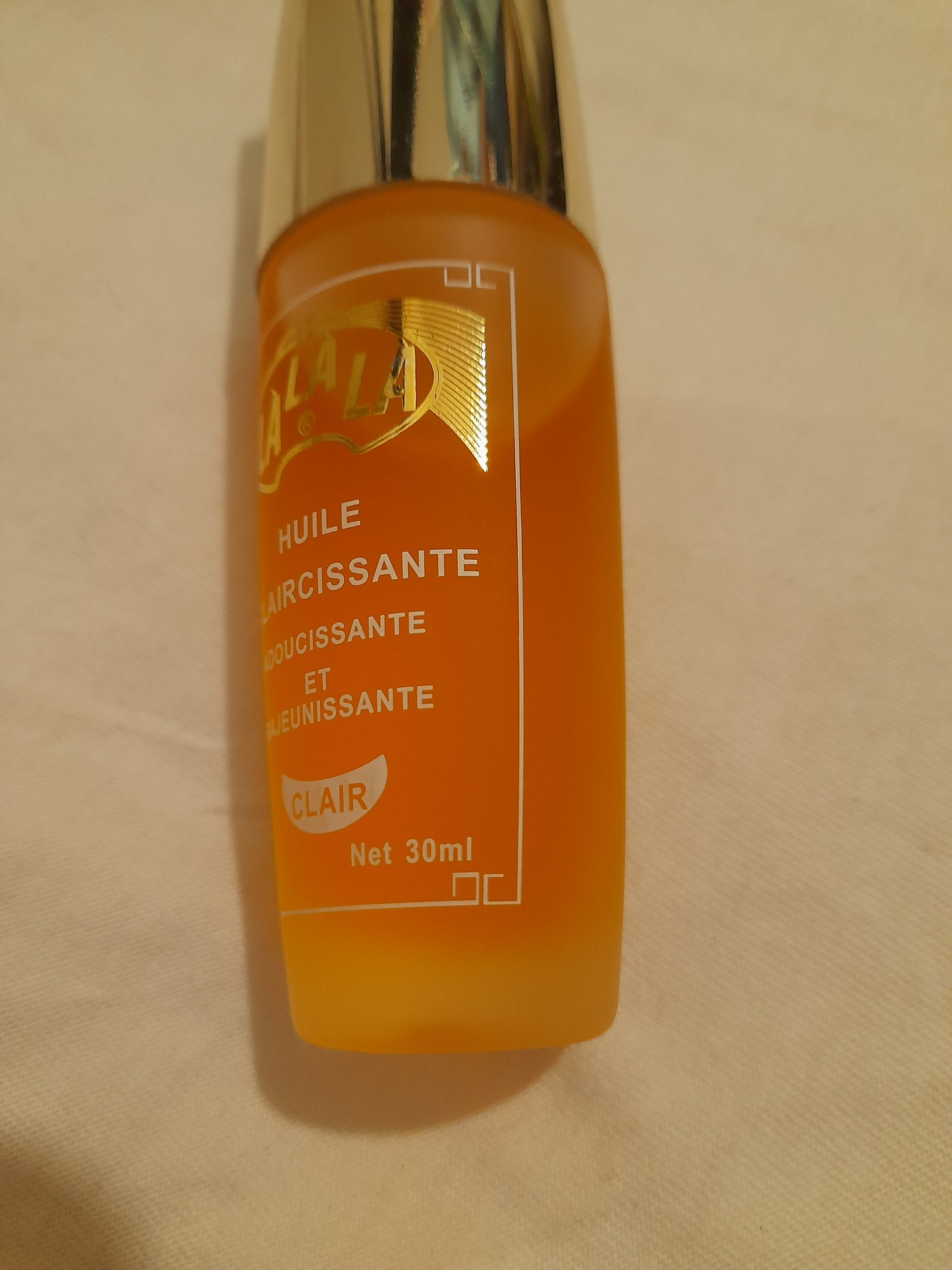 30ml Huile Eclaircissant lalala Petite Bouteille , a base de vitamine E
